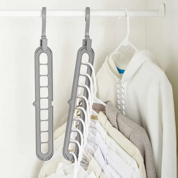 Grey Smart Hanger Pro™ shown empty and full, demonstrating the 9-slot design and its capacity to hold multiple shirts and hoodies vertically.