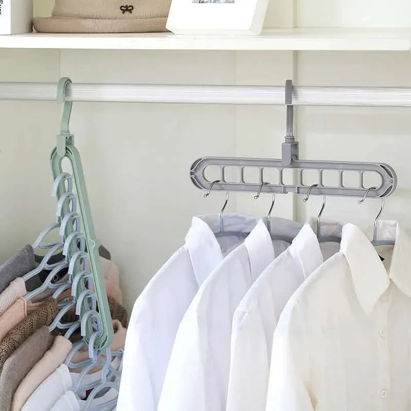 9 in 1 Smart Hanger Pro™ hanging multiple shirts neatly in a closet, maximizing space and keeping clothes organized.
